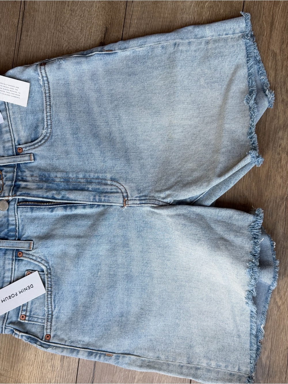 Aritzia Light Wash Boyfriend Denim Shorts with Frayed Hem